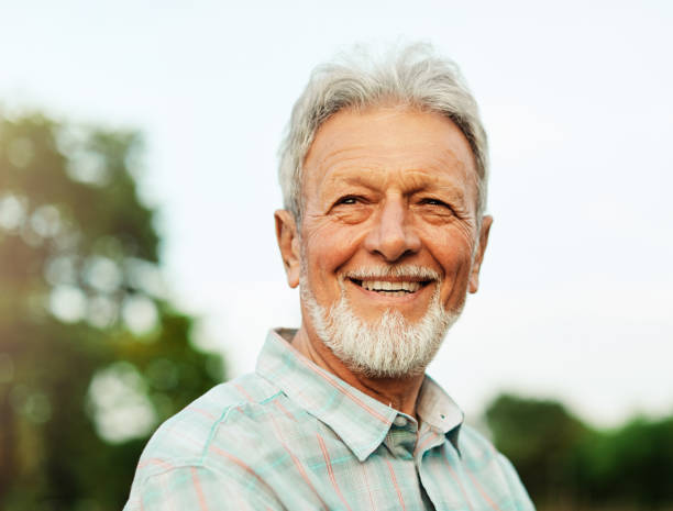 Portrait of an elderly man outdoors